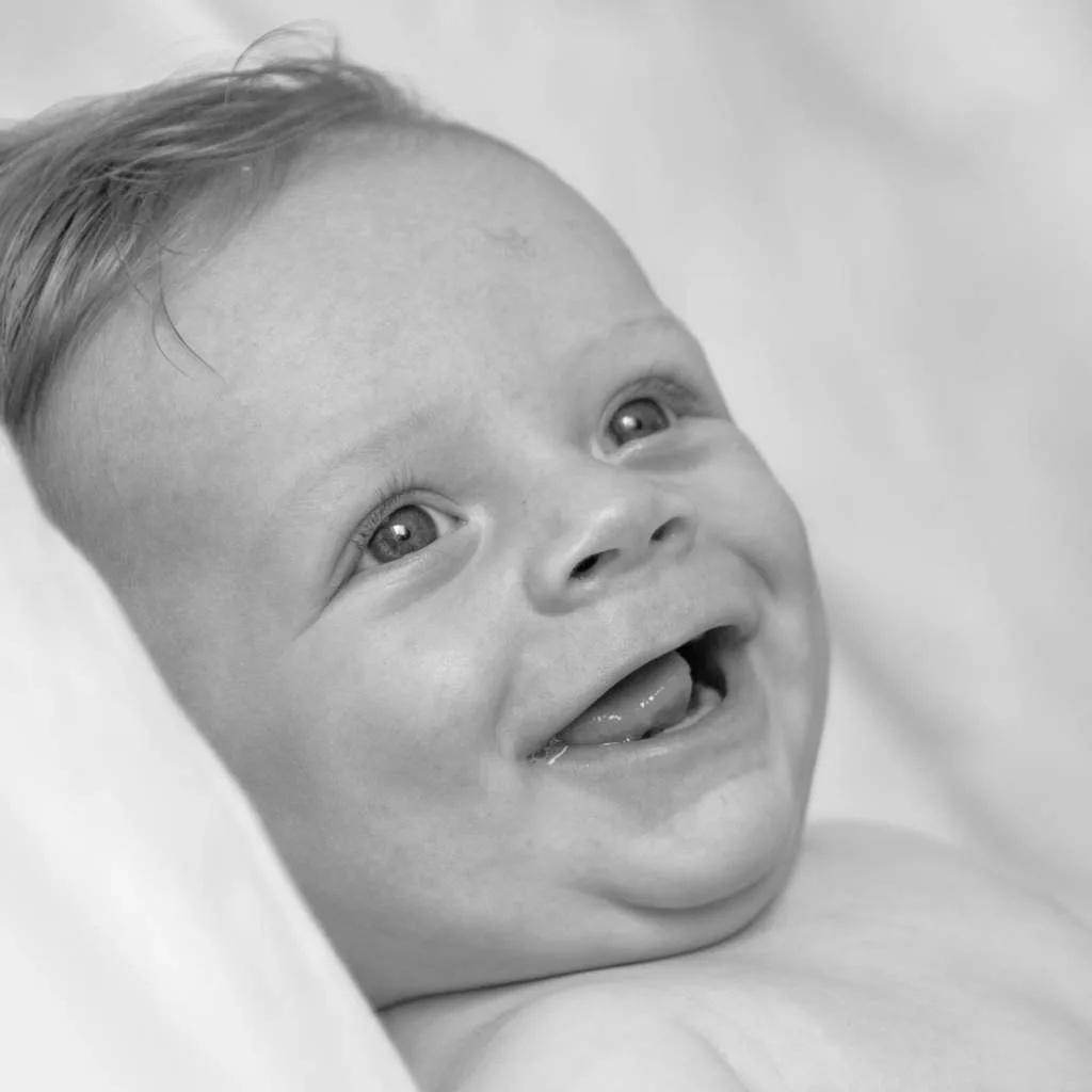 Bump to Beyond your Birth, smiling baby portrait